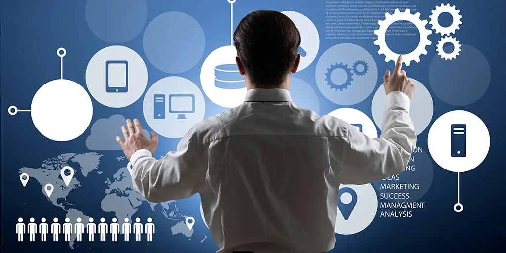 guide to servicenow itsm A man in a business suit points at a screen displaying icons related to ServiceNow ITSM.